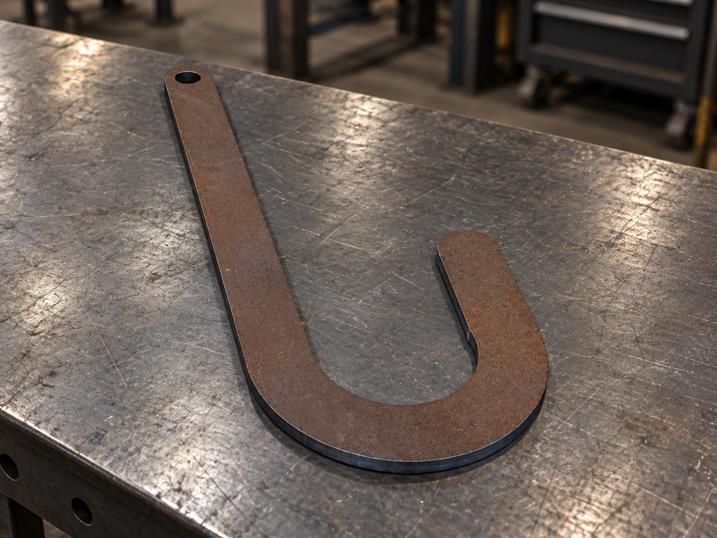 J-shaped thick steel laser-cut profile