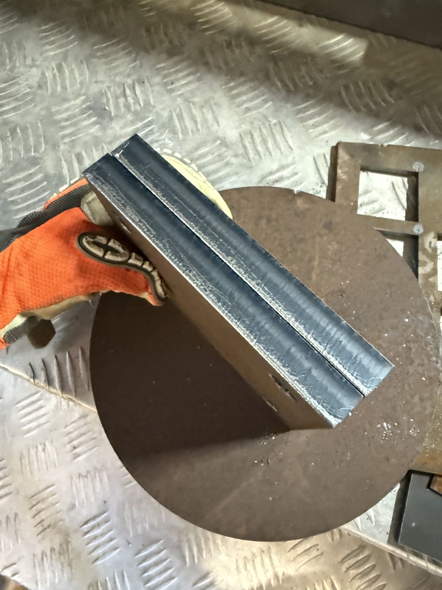 Side view of a thick laser-cut steel edge